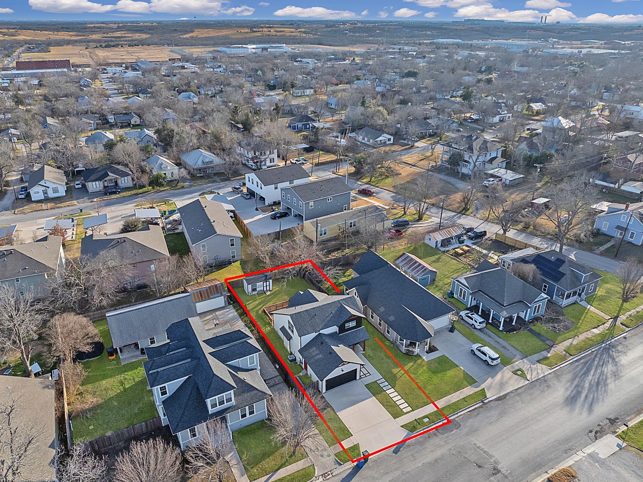 609 A West 7th Street Taylor, TX 76574 - Photo 29 of 35 an aerial view of a city with lots of residential buildings
