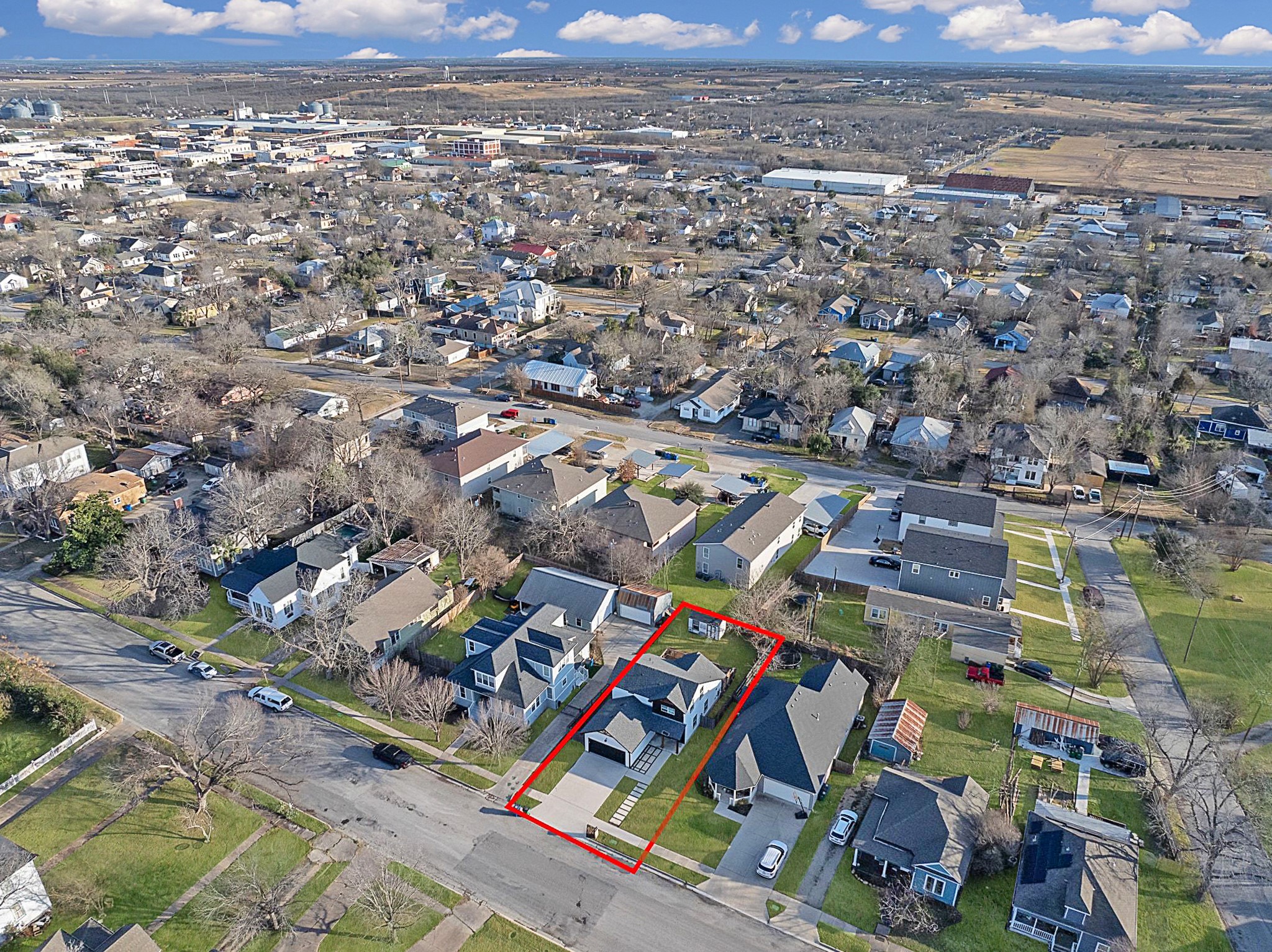 609 A West 7th Street Taylor, TX 76574 - Photo 32 of 35 an aerial view of residential houses with outdoor space