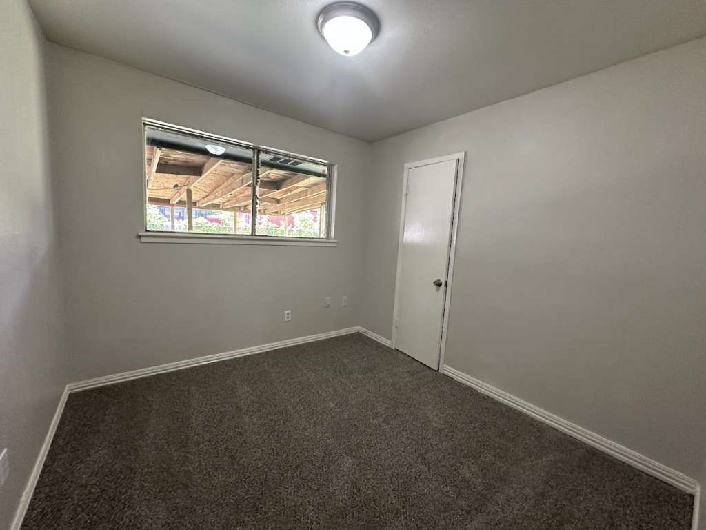 6523 Hanley Lane Houston, TX 77016 - Photo 15 of 17 an empty room with a window