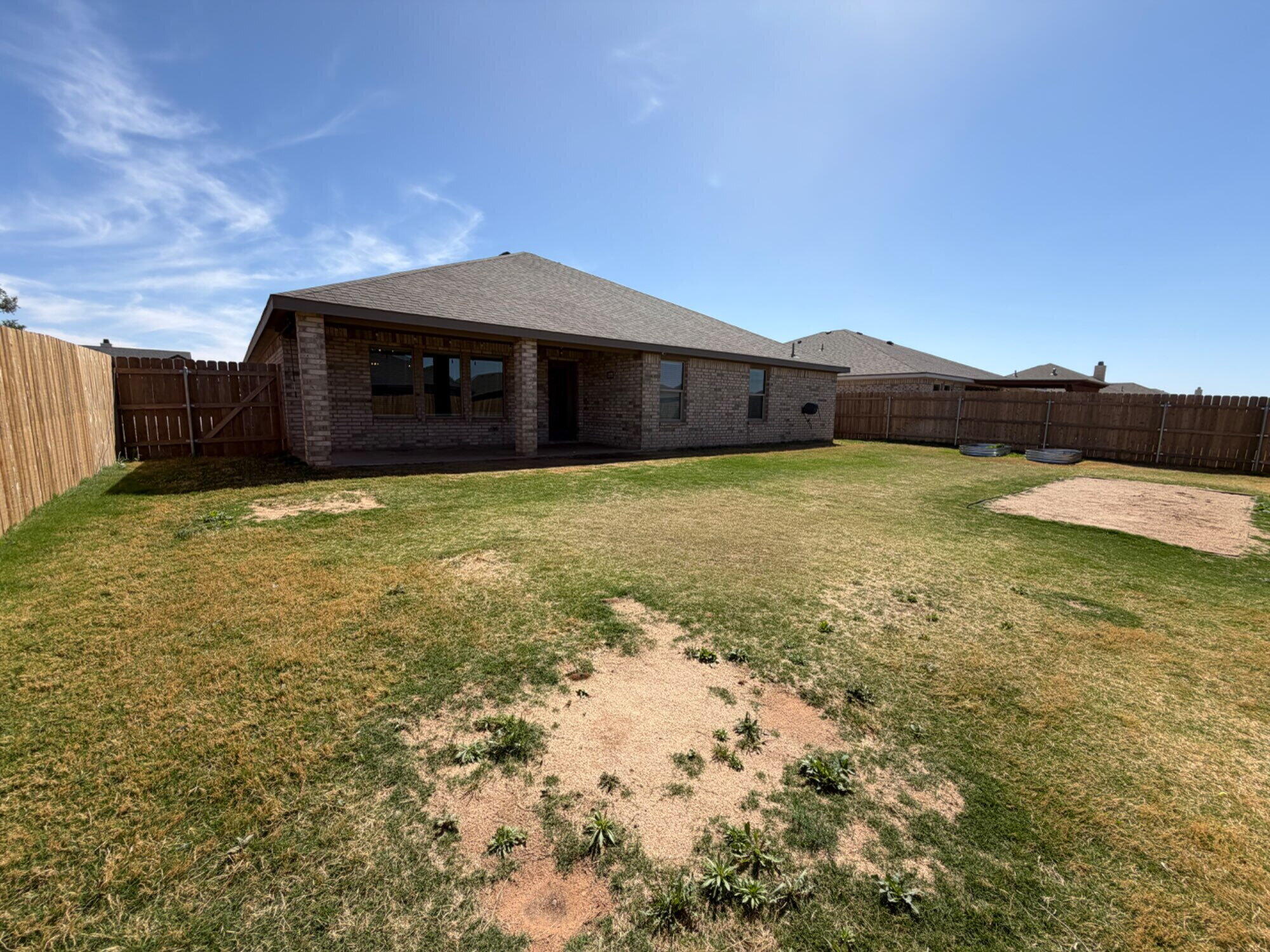 328 Ranger Street Wolfforth, TX 79382 - Photo 8 of 15 a front view of a house with a yard