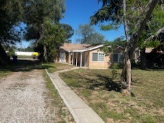 12204 14th Street, Unit A Yucaipa, CA 92399 - Photo 2 of 10 a view of a house with a yard