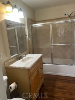 12204 14th Street, Unit A Yucaipa, CA 92399 - Photo 7 of 10 a bathroom with a sink and mirror with bathtub