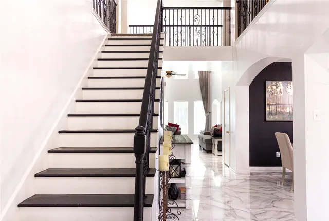 a view of a livingroom with furniture and closet