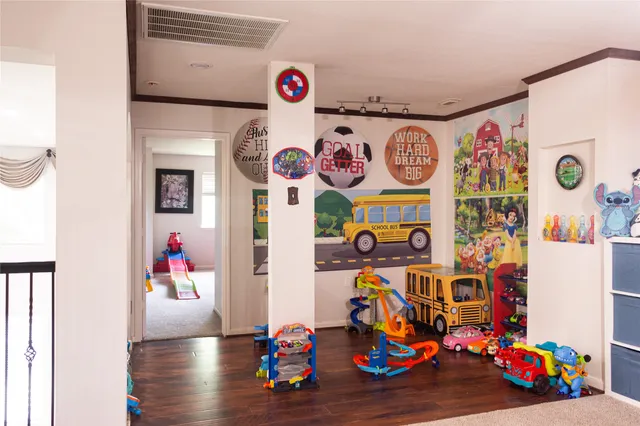 a bed room with furniture and a window