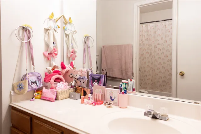 a view of a balcony with wooden floor