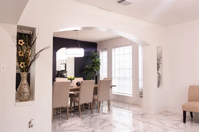 a view of a livingroom with furniture and window