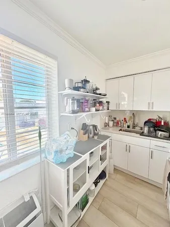 a kitchen with stainless steel appliances granite countertop a stove and a sink