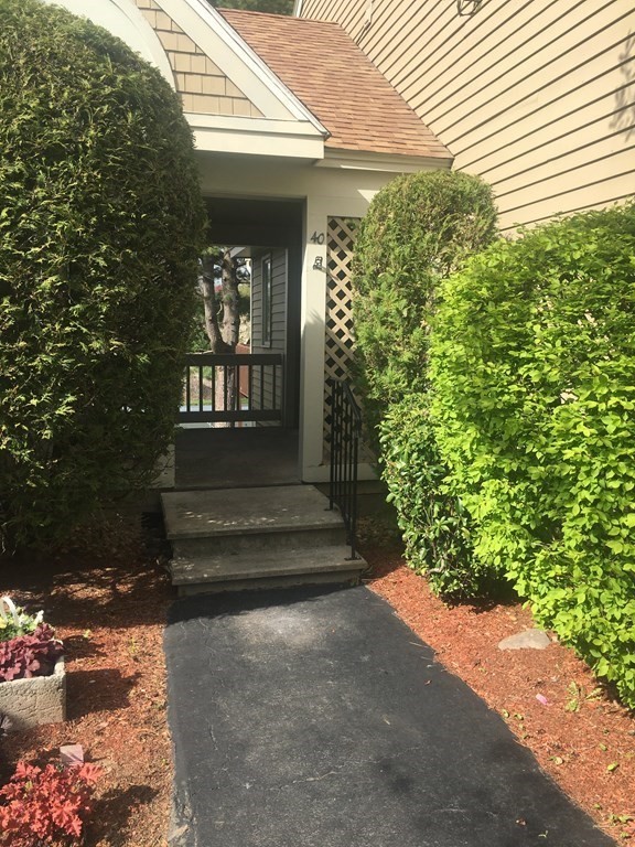 40 Hunters Run Place, Unit 40 Haverhill, MA 01832 - Photo 2 of 13 a view of house with garden
