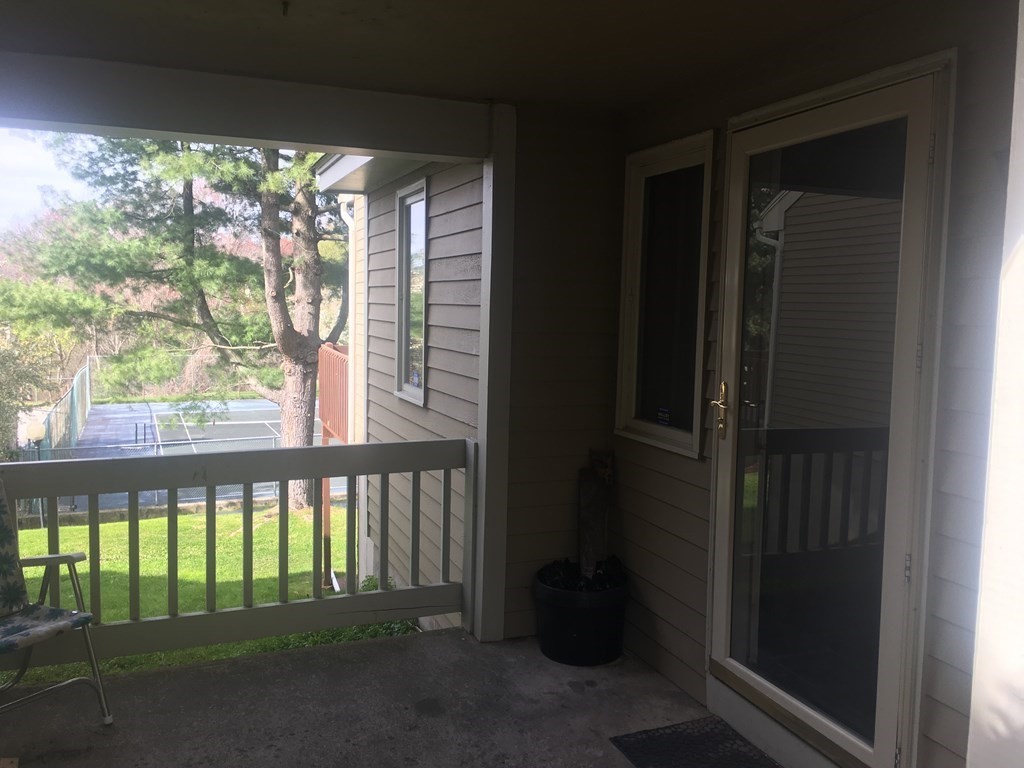 40 Hunters Run Place, Unit 40 Haverhill, MA 01832 - Photo 5 of 13 a view of a porch