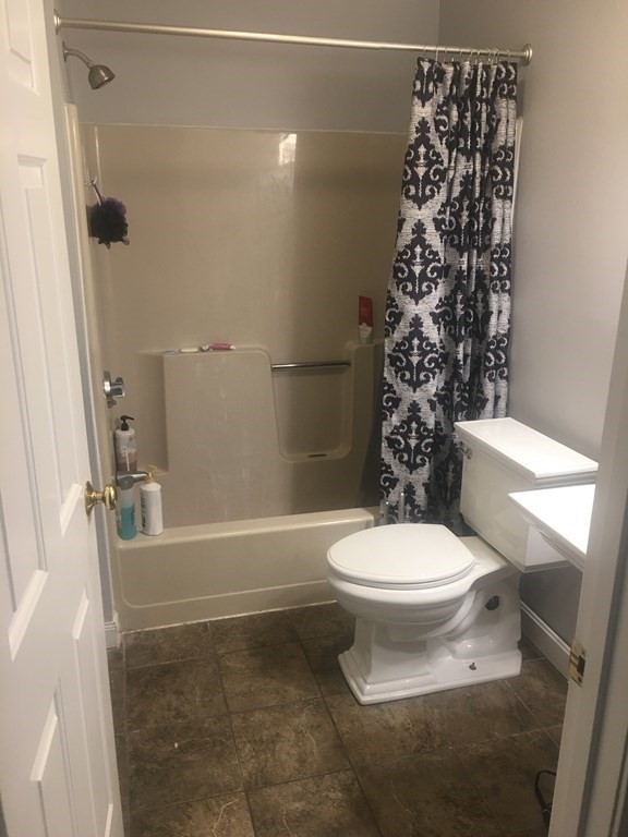 40 Hunters Run Place, Unit 40 Haverhill, MA 01832 - Photo 10 of 13 a bathroom with a toilet and shower