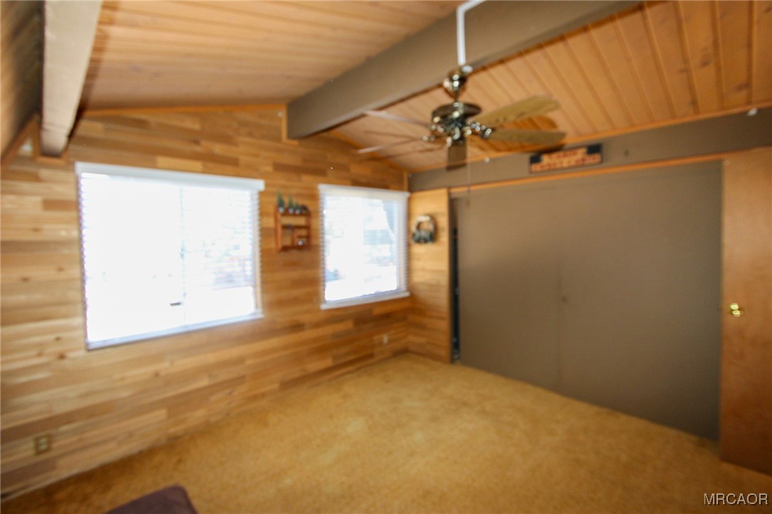 692 San Bernardino Avenue Sugarloaf, CA 92386 - Photo 16 of 20 a view of a big room with carpet