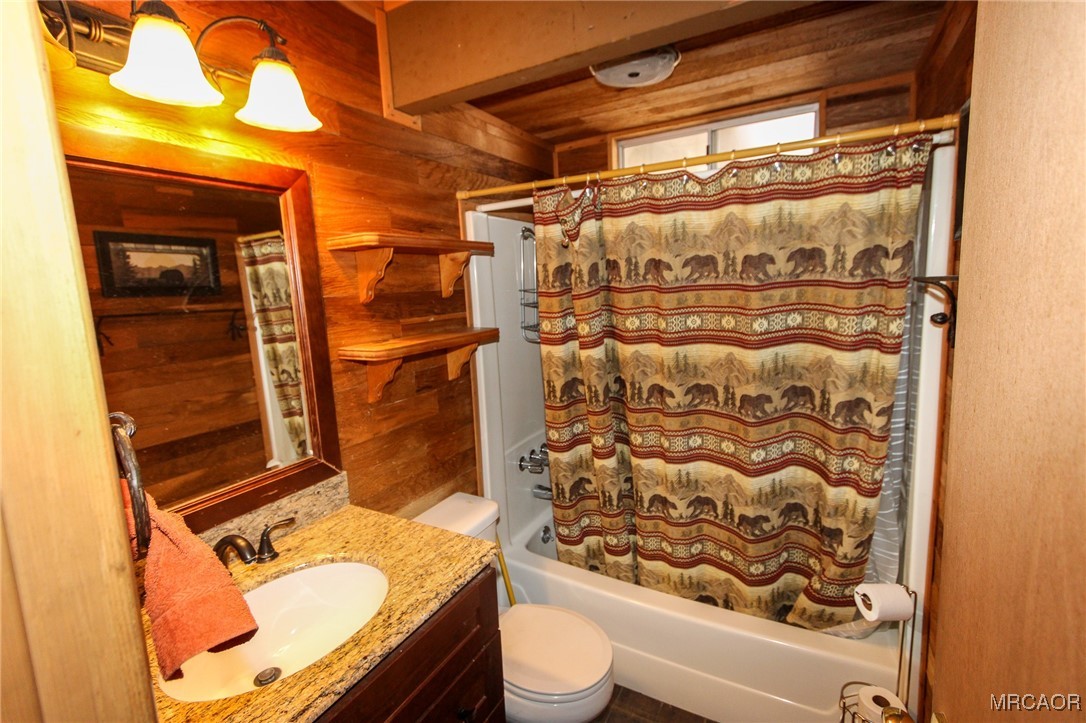 692 San Bernardino Avenue Sugarloaf, CA 92386 - Photo 10 of 20 a bathroom with a granite countertop sink toilet and shower