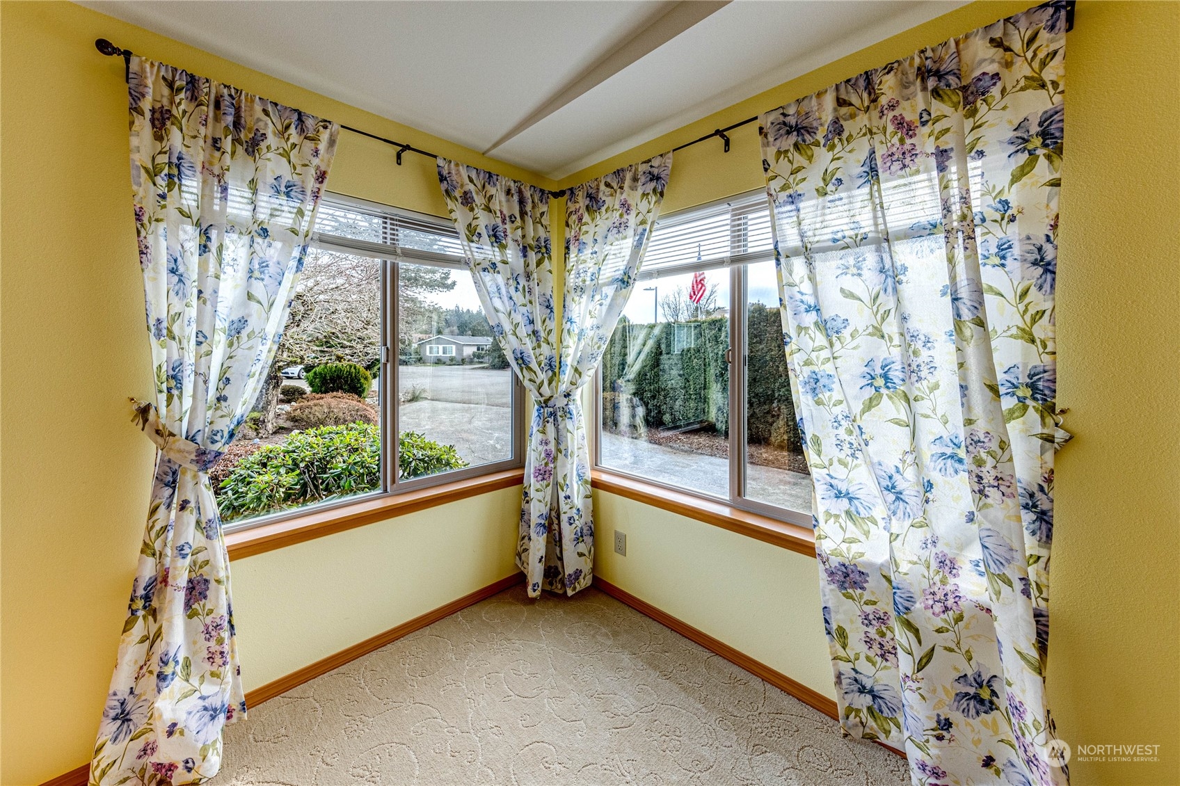 23716 Vista View Avenue Bothell, WA 98021 - Photo 17 of 29 a view of a large window with tree in front of it