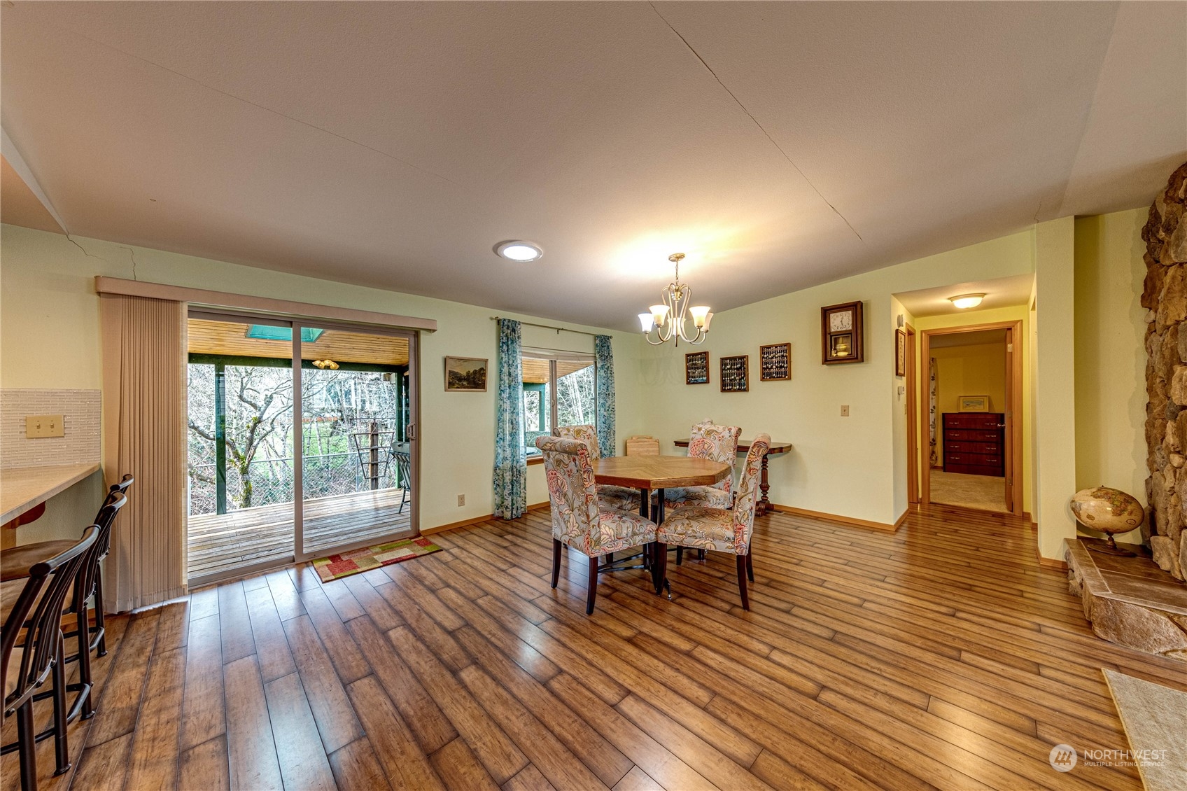 23716 Vista View Avenue Bothell, WA 98021 - Photo 8 of 29 a view of a dining room with furniture and wooden floor