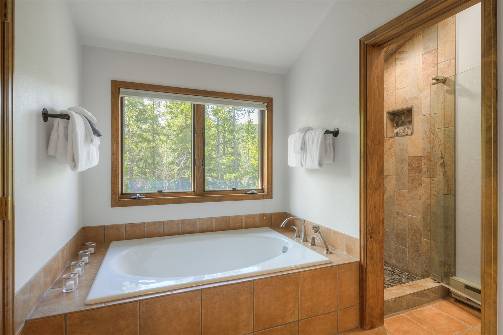 2542 Boreas Pass Road Breckenridge, CO 80424 - Photo 20 of 33 a bathroom with a tub and shower