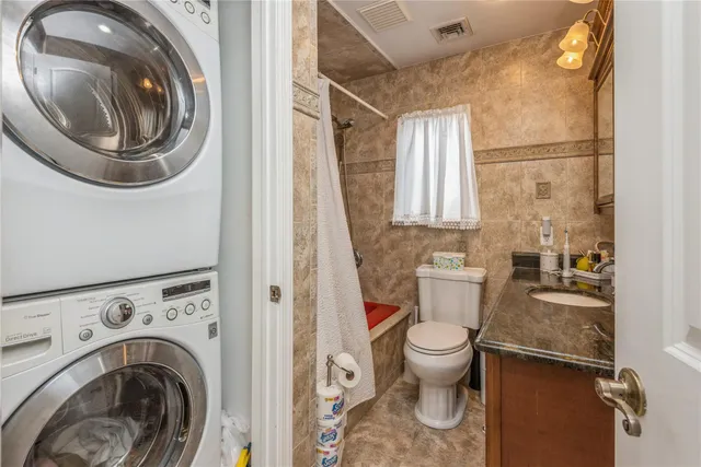 a bathroom with a toilet and a sink