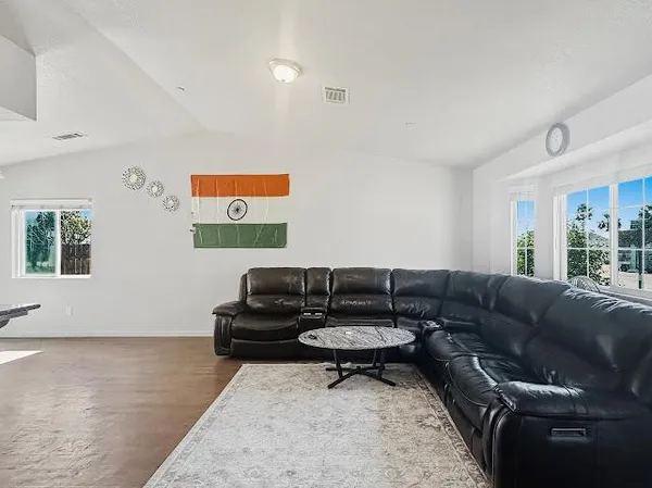 a living room with furniture and a couch