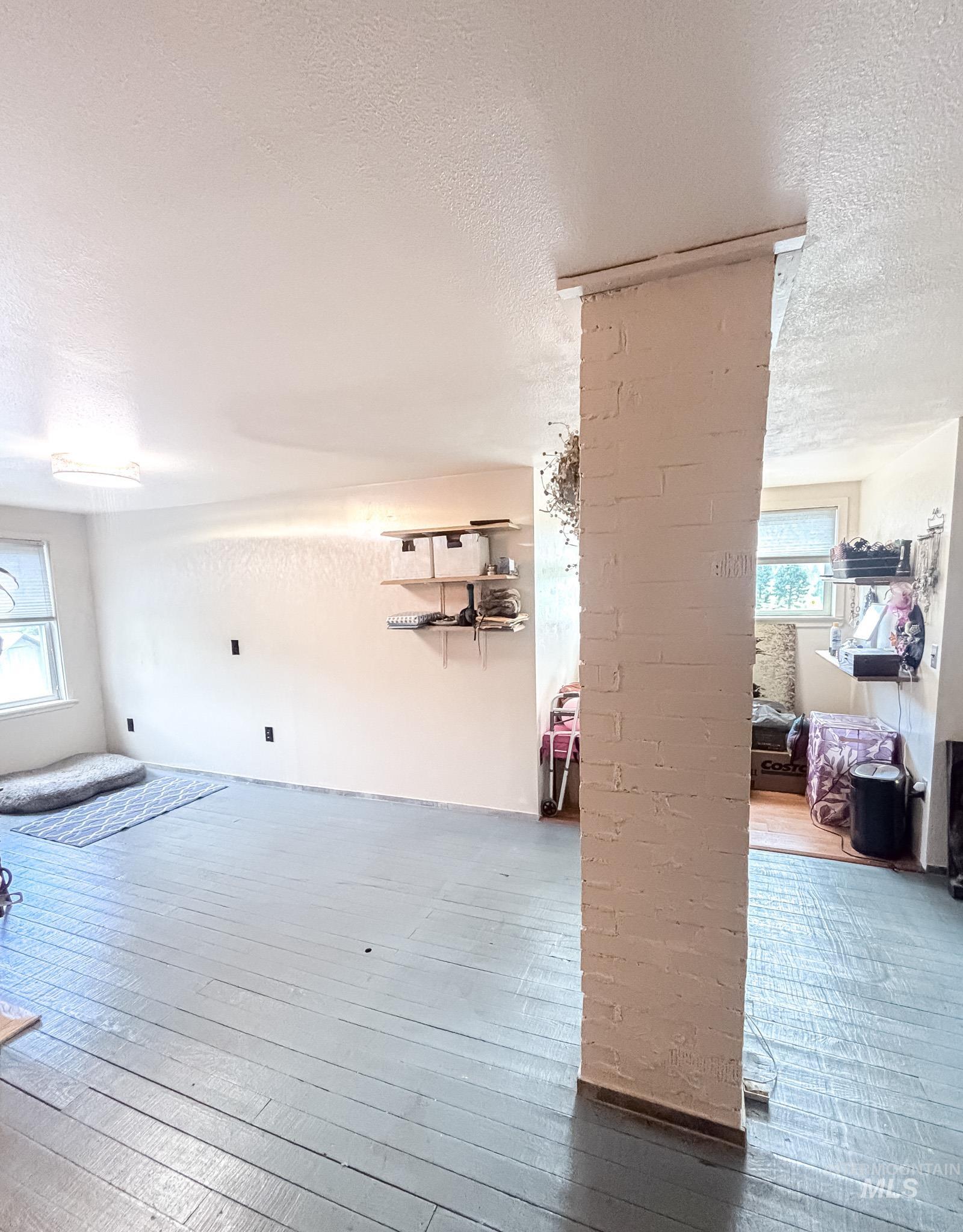 1995 Glenwood Road Kamiah, ID 83536 - Photo 23 of 38 Painted wood-finish flooring extending throughout the space