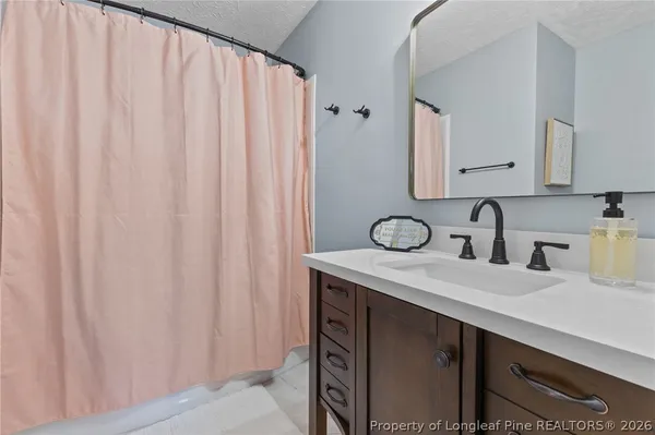 a close view of two sink and a microwave