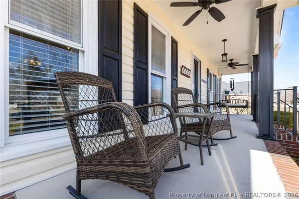 a view of balcony with furniture
