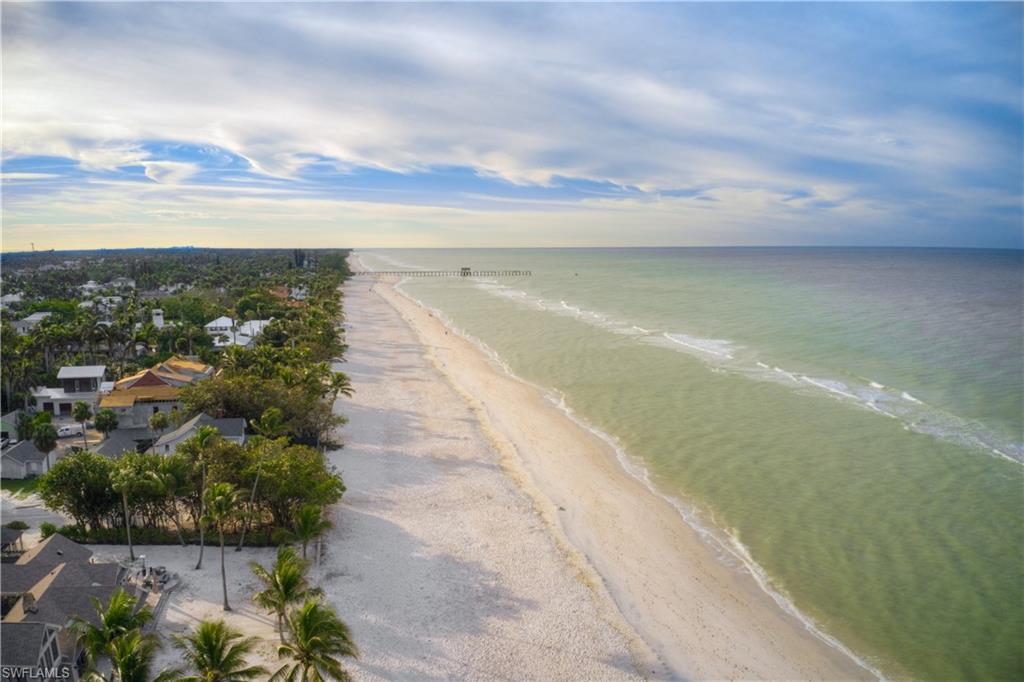 655 8th Avenue South, Unit 3 Naples, FL 34102 - Photo 48 of 48 a view of an ocean and beach