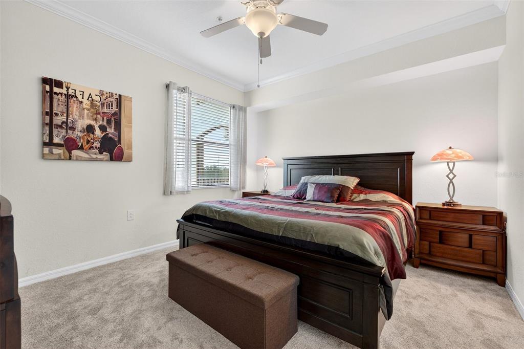 16904 Vardon Terrace, Unit 301 Lakewood Ranch, FL 34211 - Photo 15 of 53 a bedroom with bed and window