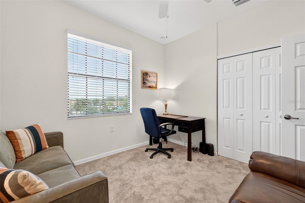 16904 Vardon Terrace, Unit 301 Lakewood Ranch, FL 34211 - Photo 24 of 53 a work room with furniture and windows