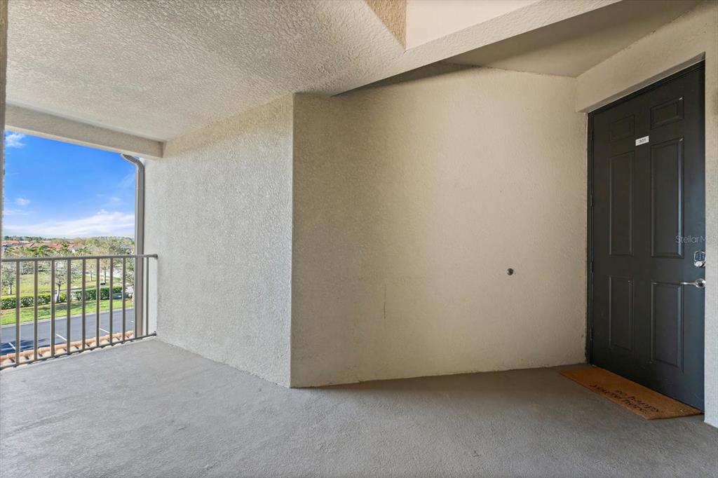 16904 Vardon Terrace, Unit 301 Lakewood Ranch, FL 34211 - Photo 3 of 28 a view of an empty room with a window
