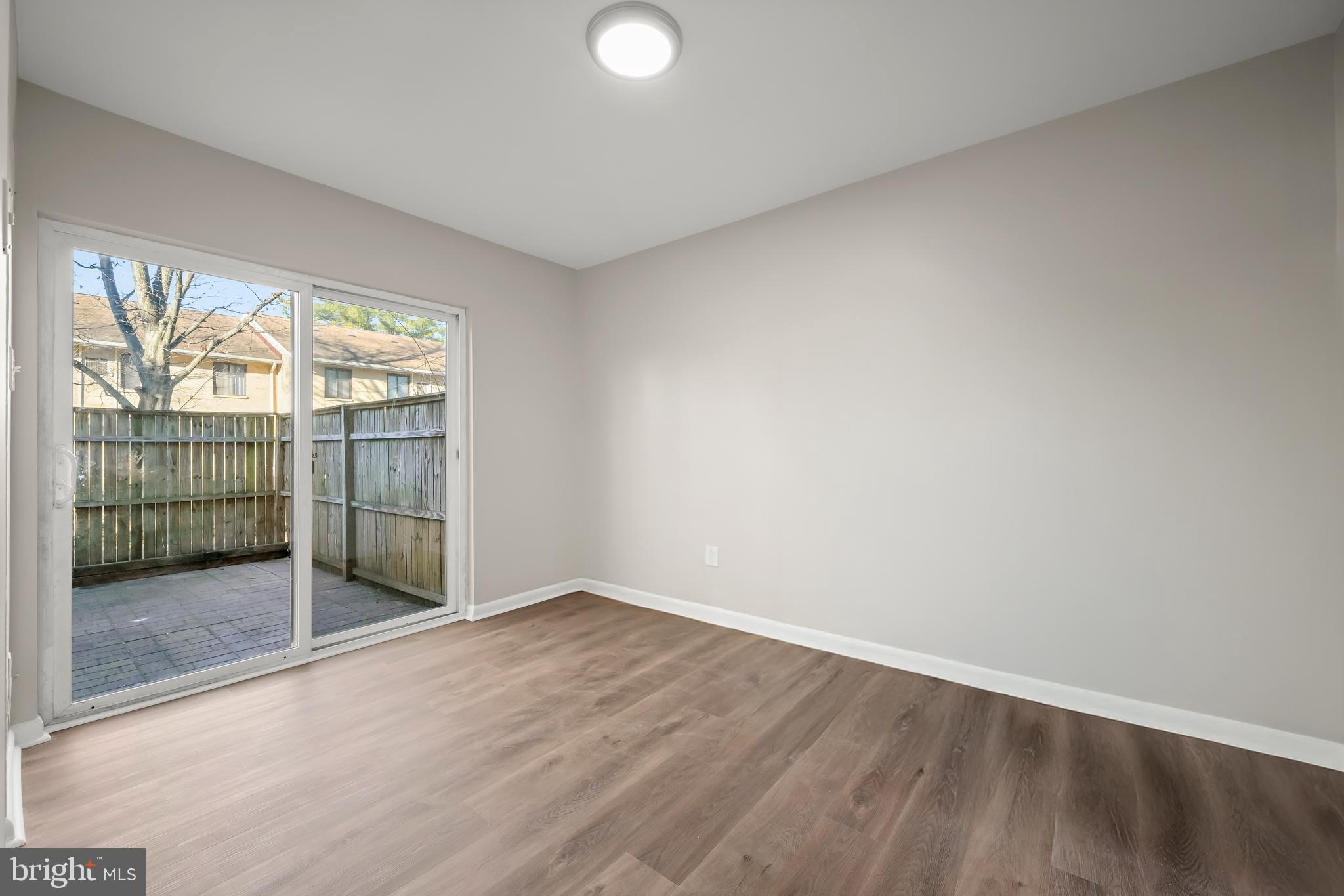 8869 Tamebird Court, Unit D T22 Columbia, MD 21045 - Photo 12 of 39 Dining room w/ patio access