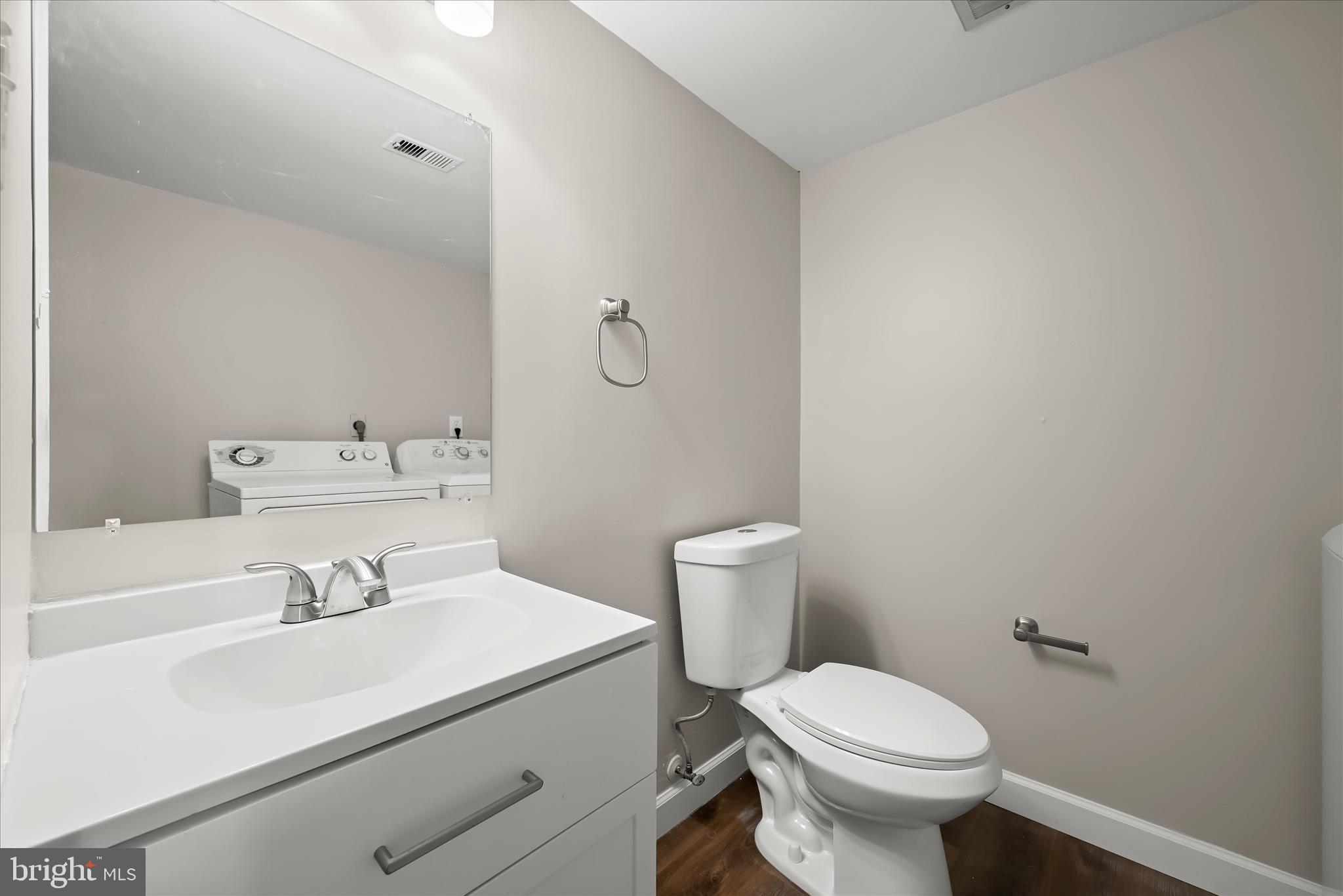 8869 Tamebird Court, Unit D T22 Columbia, MD 21045 - Photo 17 of 39 Half bath / laundry room