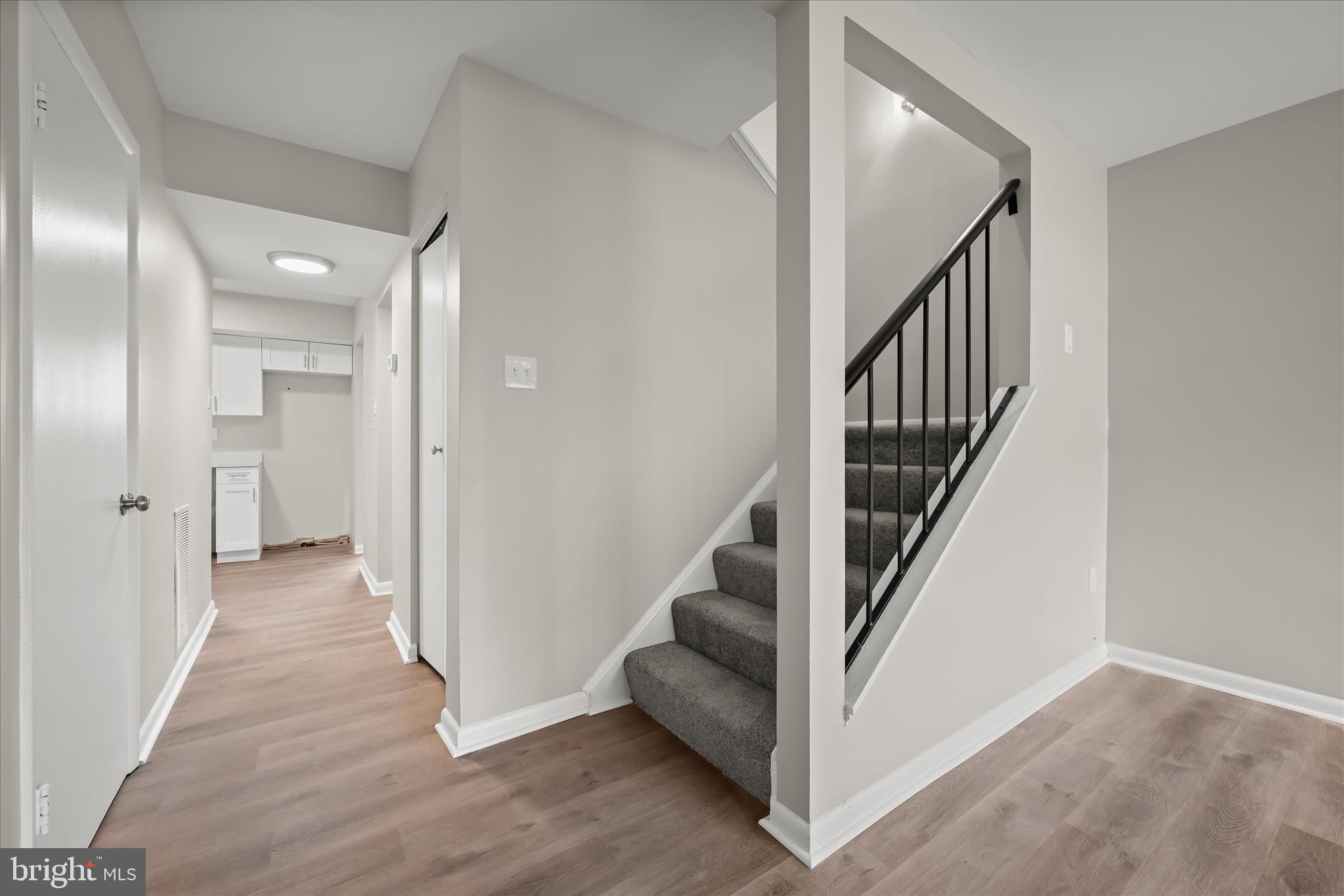8869 Tamebird Court, Unit D T22 Columbia, MD 21045 - Photo 19 of 39 Staircase to upper level