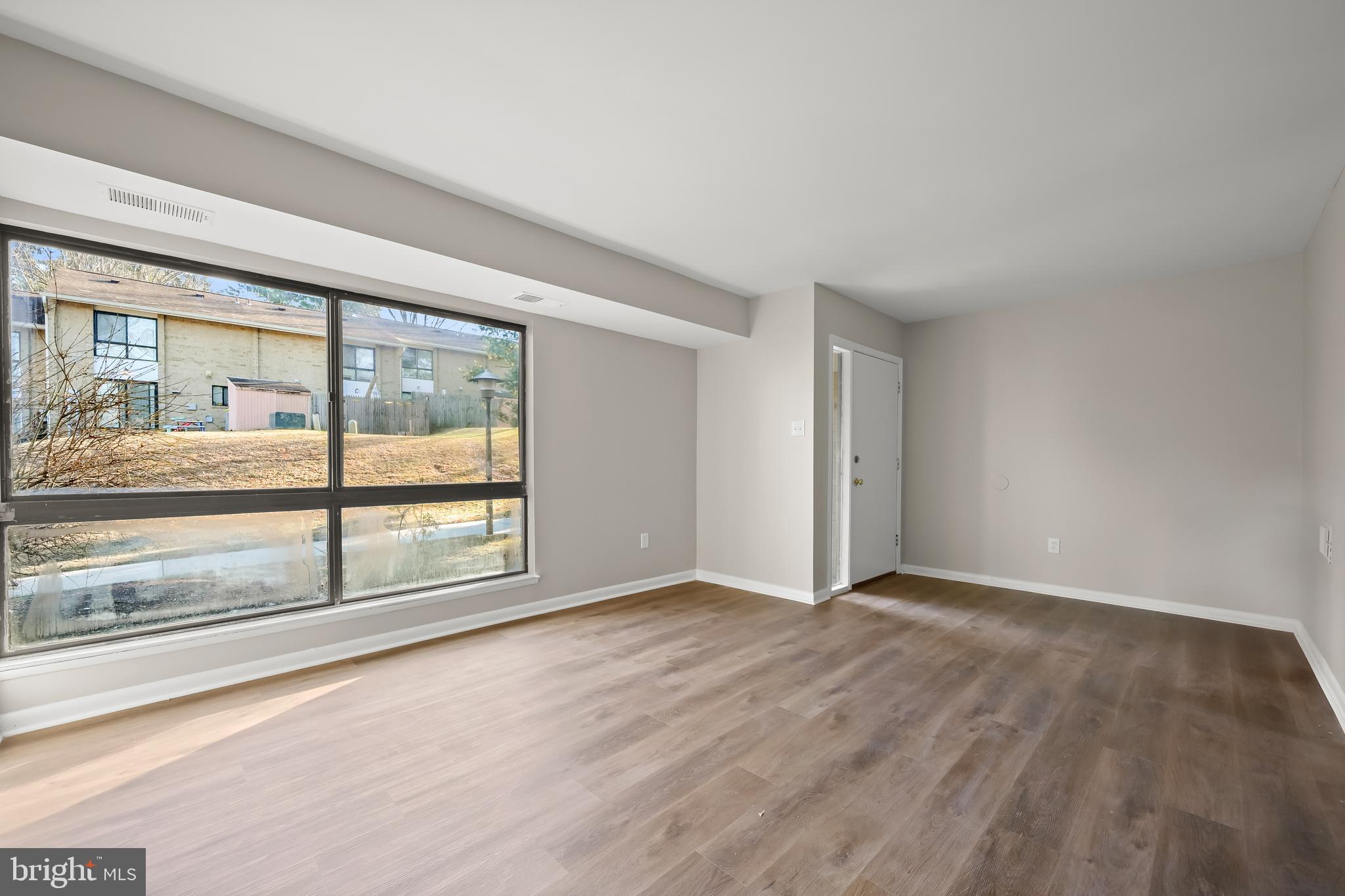 8869 Tamebird Court, Unit D T22 Columbia, MD 21045 - Photo 10 of 39 Living room & foyer