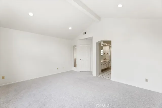 a bathroom with a bathtub and a sink