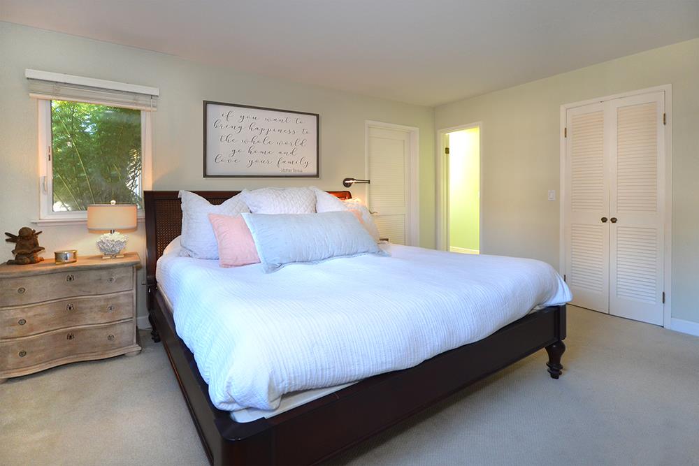 114 Solano Avenue La Selva Beach, CA 95076 - Photo 14 of 38 a bedroom with a bed and window