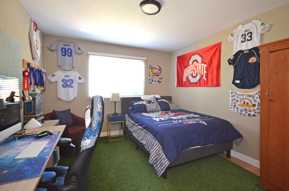 114 Solano Avenue La Selva Beach, CA 95076 - Photo 18 of 38 a bedroom with a bed and furniture