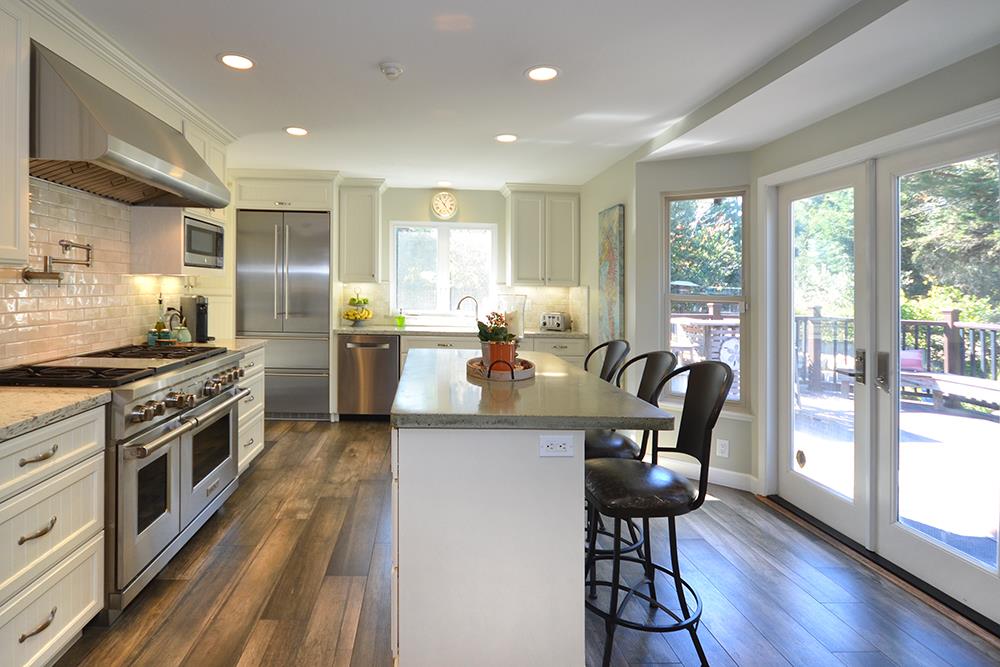 114 Solano Avenue La Selva Beach, CA 95076 - Photo 2 of 38 a kitchen with lots of counter top space and wooden floor