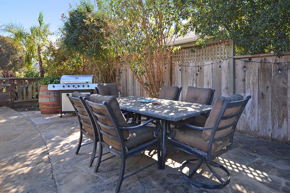 114 Solano Avenue La Selva Beach, CA 95076 - Photo 28 of 38 a view of a dinning table and chairs in the patio