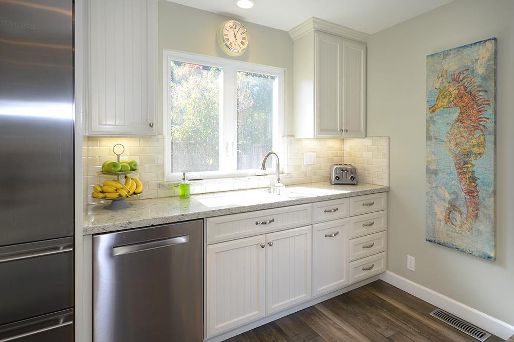 114 Solano Avenue La Selva Beach, CA 95076 - Photo 5 of 38 a sink with window and cabinet