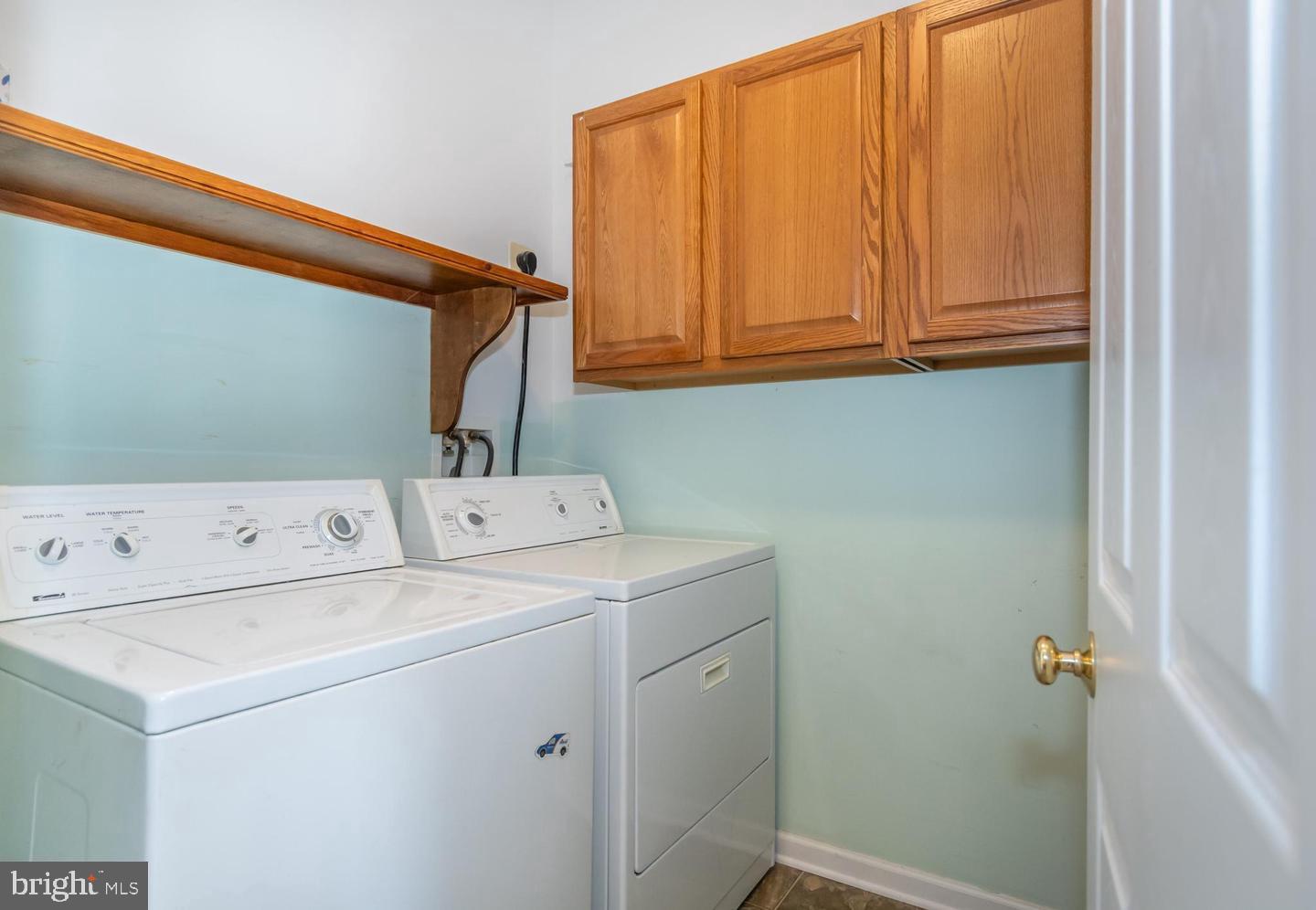 8186 June Way, Unit 601 Easton, MD 21601 - Photo 7 of 30 a utility room with dryer and washer
