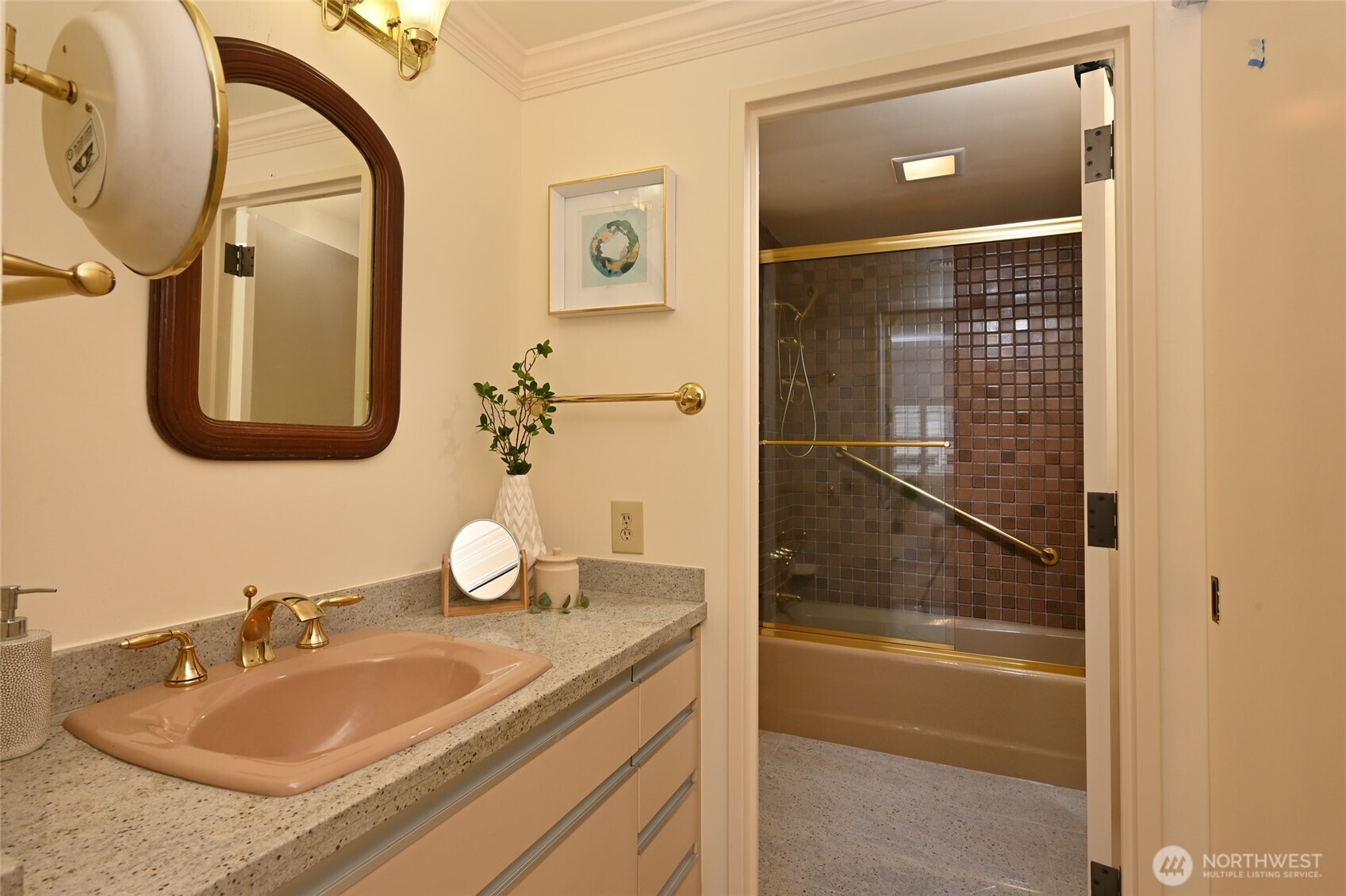 1301 Spring Street, Unit 6D Seattle, WA 98104 - Photo 15 of 29 a bathroom with a granite countertop sink and a mirror