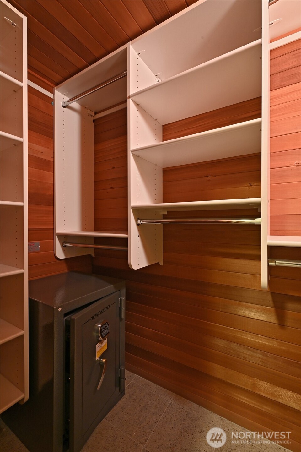 1301 Spring Street, Unit 6D Seattle, WA 98104 - Photo 23 of 29 a bathroom with a sink and a mirror