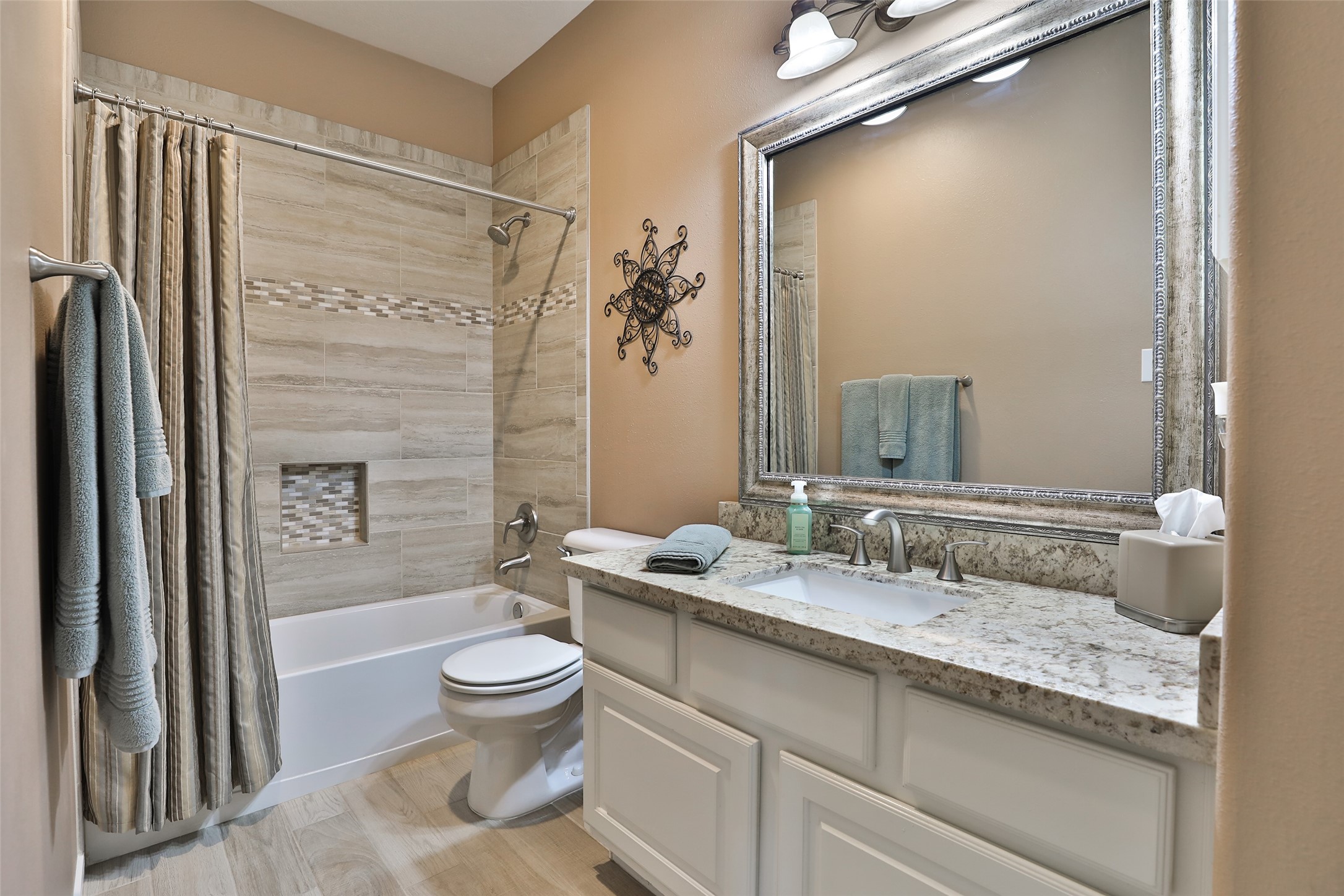 20519 Windrose Bend Drive Spring, TX 77379 - Photo 8 of 37 The first secondary bathroom, conveniently located adjacent to its own bedroom while remaining perfectly positioned for guest use.