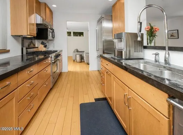 a large kitchen with cabinets