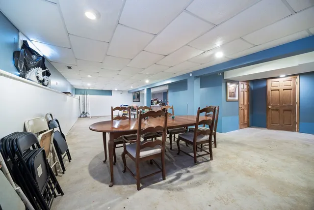 a view of a room with furniture and lots of furniture