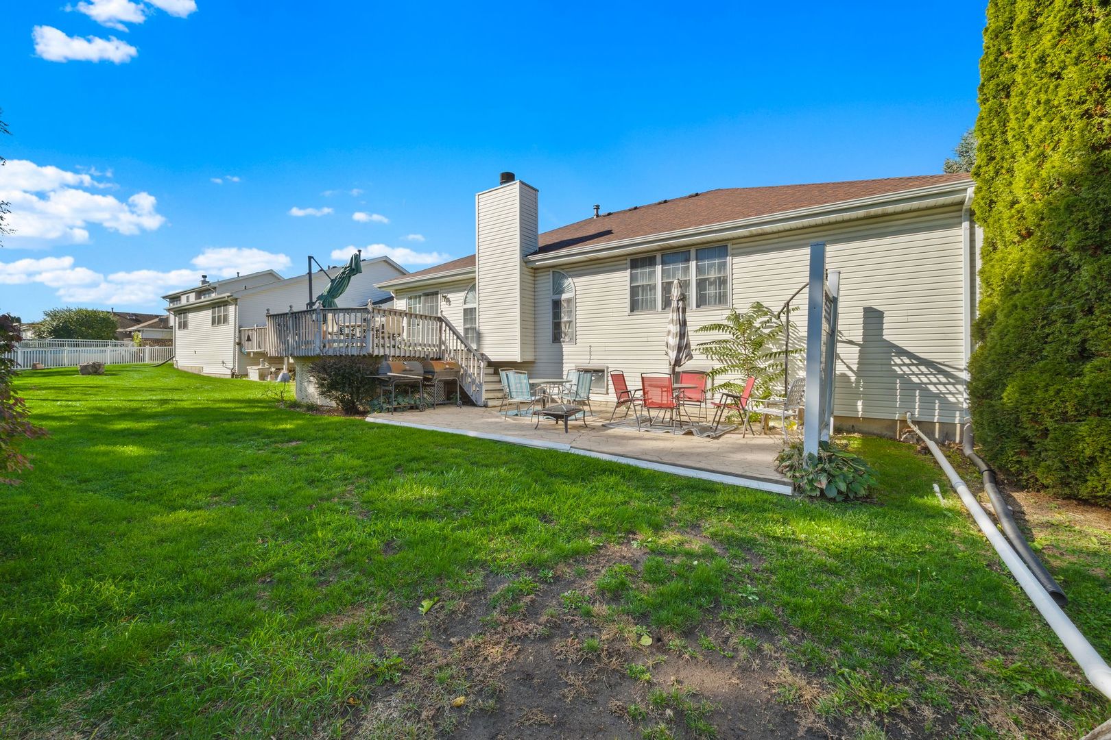 3207 Sandy Ridge Drive Steger, IL 60475 - Photo 17 of 20 a view of a house with a backyard porch and sitting area