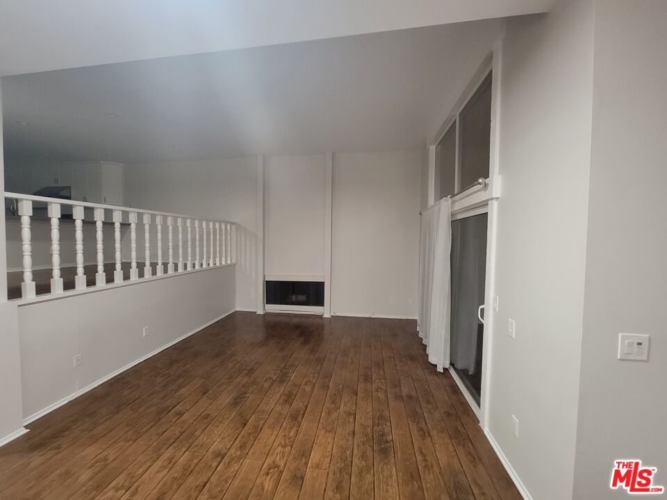 4866 1/2 McConnell Avenue Los Angeles, CA 90066 - Photo 10 of 11 a view of empty room with wooden floor