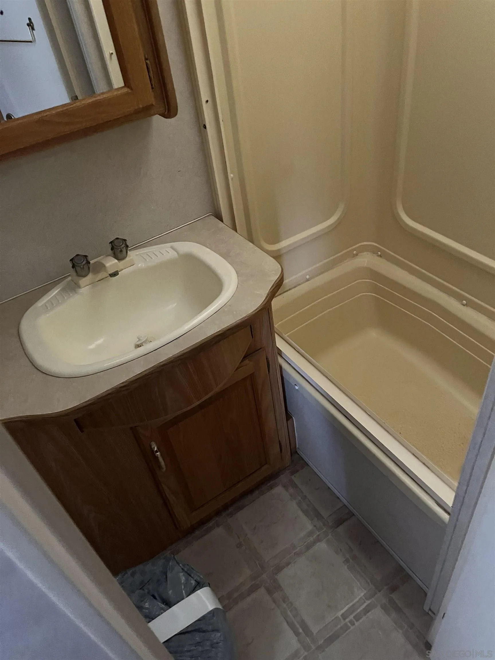 2782 Ribbonwood Road Boulevard, CA 91905 - Photo 14 of 24 a bathroom with a sink and a bathtub