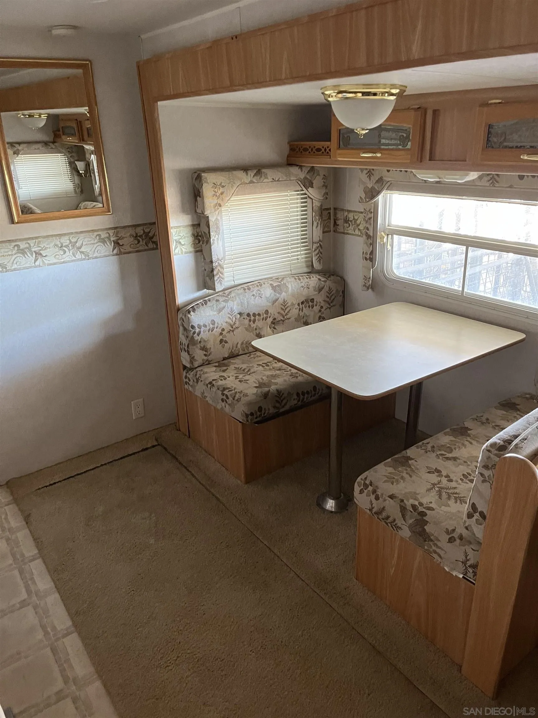 2782 Ribbonwood Road Boulevard, CA 91905 - Photo 20 of 24 a en suite bathroom with a granite countertop sink and a mirror