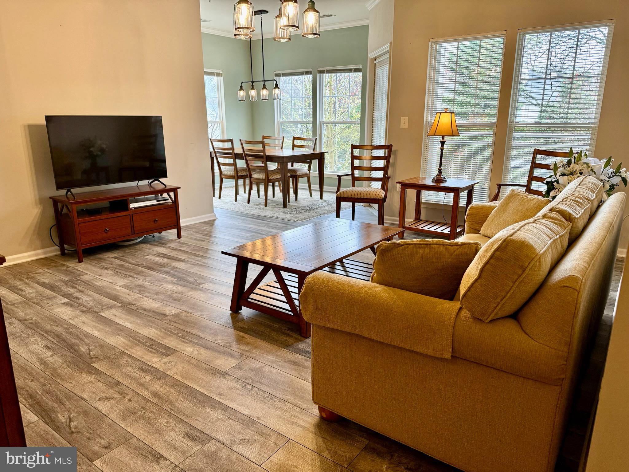 1515 North Point Drive, Unit 201 Reston, VA 20194 - Photo 4 of 37 Open Living Room/Dining Room