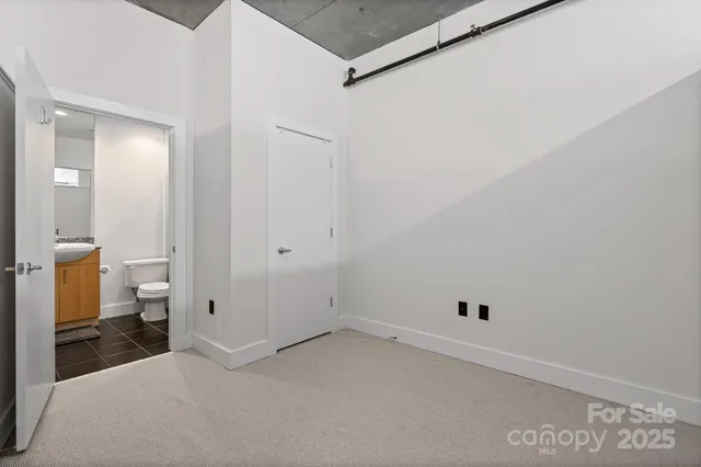 a view of a room with a hallway